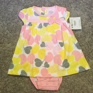 Onsie/ dress attached.